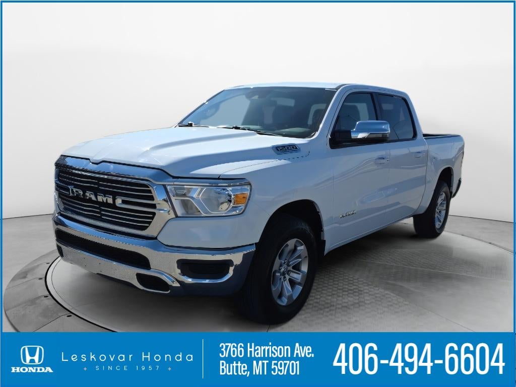 2024 RAM 1500 Laramie in Bright White Clearcoat — front three-quarter view