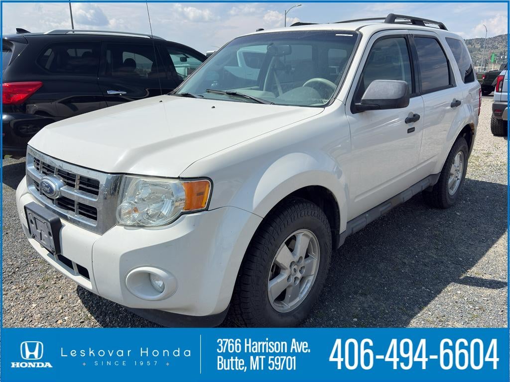 2012 Ford Escape XLT in White Suede — front three-quarter view