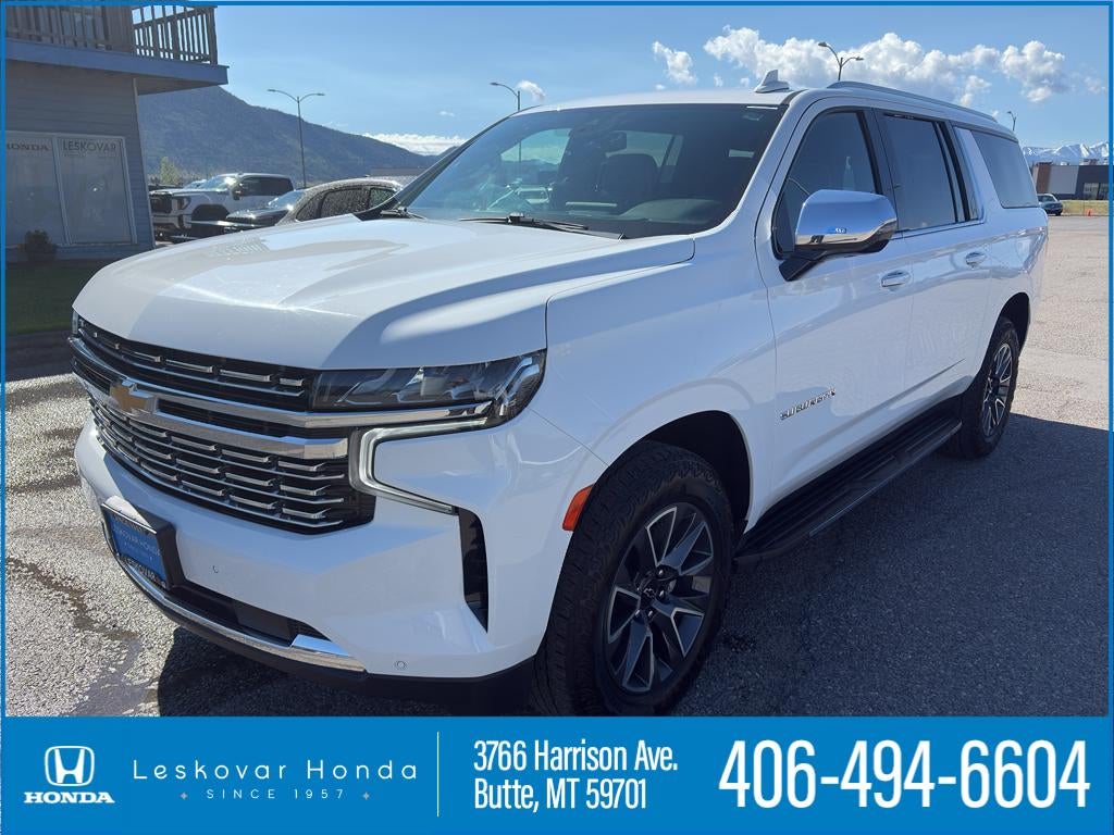 2022 Chevrolet Suburban Premier in Summit White — front three-quarter view