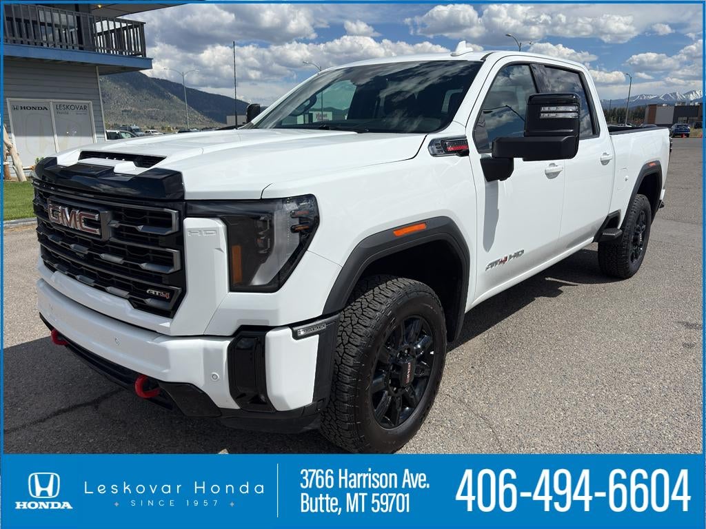 2026 GMC Sierra AT4 in Summit White — front three-quarter view
