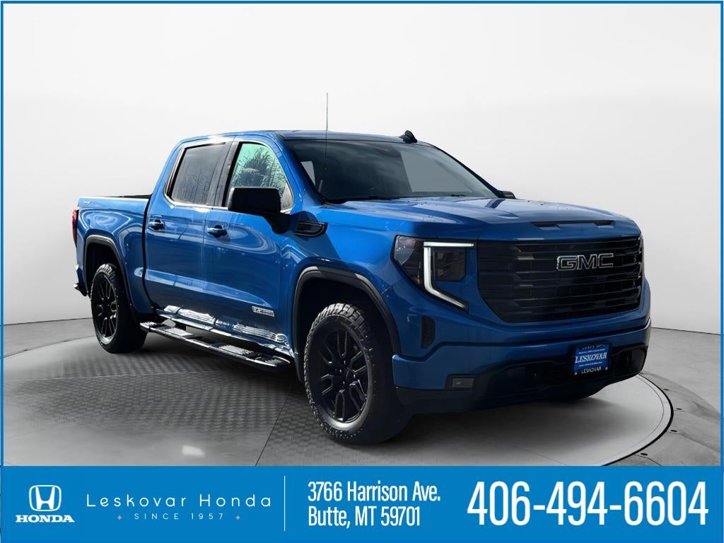 2023 GMC Sierra Elevation in Dynamic Blue Metallic — front three-quarter view