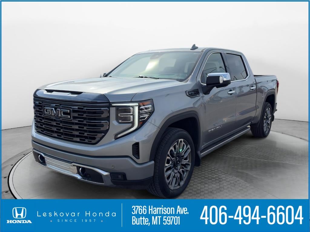 2024 GMC Sierra Denali Ultimate in Sterling Metallic — front three-quarter view