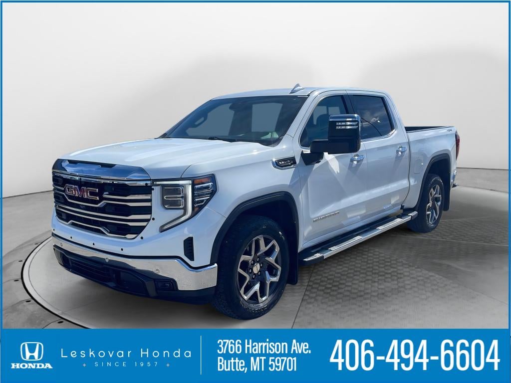 2023 GMC Sierra SLT in Summit White — front three-quarter view
