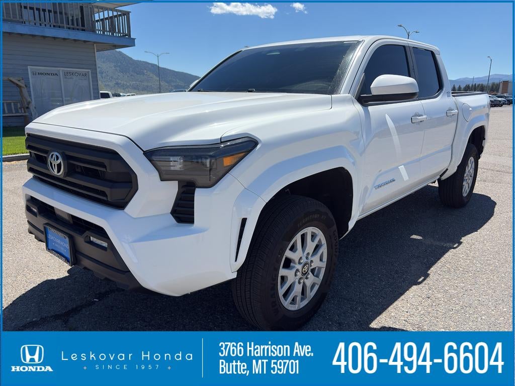 2025 Toyota Tacoma SR5 in Ice Cap — front three-quarter view